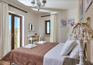 Posteľ alebo postele v izbe v ubytovaní Orelia Cretan Deluxe Apartments