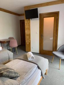 Postel nebo postele na pokoji v ubytování Willa Kobiela