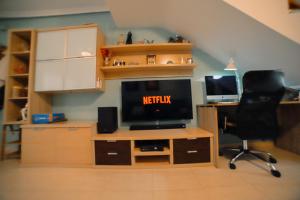 Telewizja i/lub zestaw kina domowego w obiekcie Casa Mar Menor