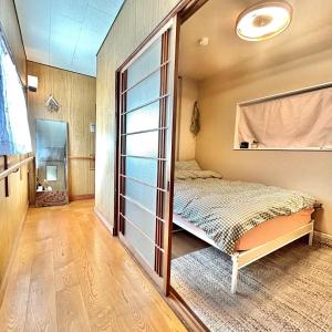 Кровать или кровати в номере Hayashi Minshuku - An - Vacation STAY 15941