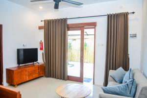 Μια τηλεόραση ή/και κέντρο ψυχαγωγίας στο Tuti House Gili Trawangan