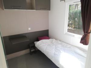 Postel nebo postele na pokoji v ubytování Mobil home Côte d'Opale