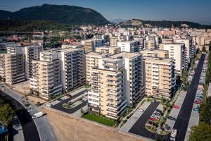 an aerial view of a city with tall buildings at STUDIO 92- URBAN PLAZA in Braşov
