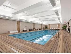 a large swimming pool in a large room at Spectacular 2 Beds/2 Baths Apartment in New York