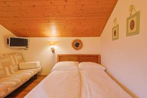 Posteľ alebo postele v izbe v ubytovaní Apartmány Anička ubytovanie region Liptovský Mikuláš