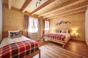Postel nebo postele na pokoji v ubytování Chalet Lauterbrunnen