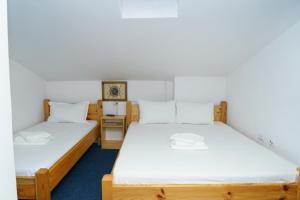 Postel nebo postele na pokoji v ubytování Hostel km 0