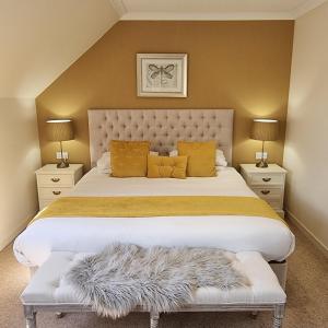 Säng eller sängar i ett rum på Loch View, Lairg