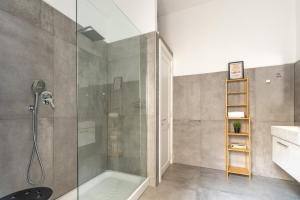 A bathroom at Sant'Agostino Apartment with Terrace by Wonderful Italy