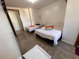 Voodi või voodid majutusasutuse Dantas Hotel toas