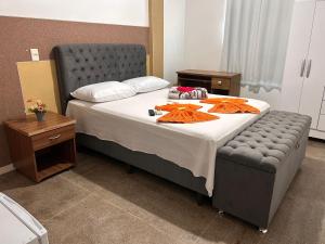 Postel nebo postele na pokoji v ubytování Dantas Hotel