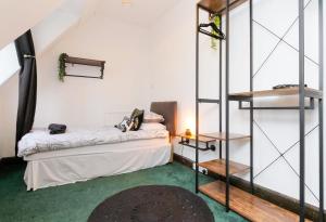 Postel nebo postele na pokoji v ubytování Carlton Hotel