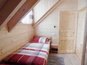 מיטה או מיטות בחדר ב-Ferienwohnung H3 mit Balkon