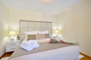 Katil atau katil-katil dalam bilik di FK LISTON Apartment