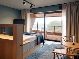 Voodi või voodid majutusasutuse Eriksberg Hotel & Nature Reserve toas
