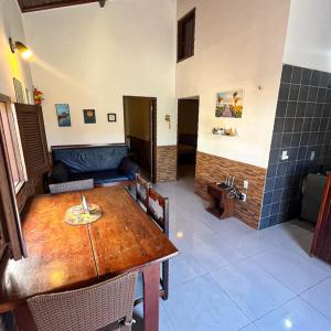 Posezení v ubytování Casa com ar-condicionados e localização perfeita + 15 fotografií