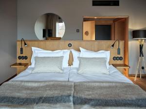 Voodi või voodid majutusasutuse Eriksberg Hotel & Nature Reserve toas