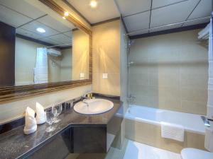 Kupaonica u objektu Orchid Vue Hotel