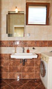 Koupelna v ubytování Makotel Apartmanház