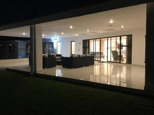a large living room with a couch and chairs at The Garden of Eden in Johannesburg +21 photos