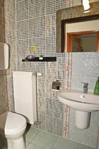 Koupelna v ubytování Makotel Apartmanház