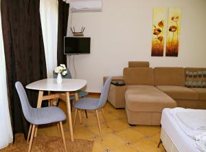 Posezení v ubytování Makotel Apartmanház