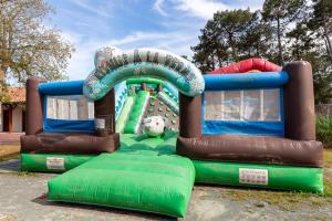 a water slide at a playground at maison cosy avec piscine, tennis, piste cyclable in Ondres