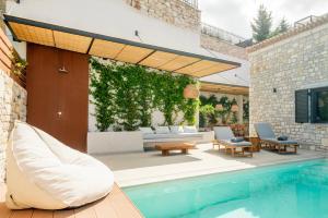 Bazén v ubytování Archico nebo v jeho okolí