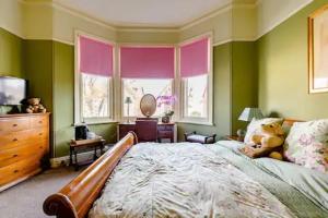 Voodi või voodid majutusasutuse Victorian Guest House 200m from the Seafront toas