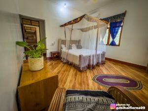 Postel nebo postele na pokoji v ubytování Tofauti Inn + 37 fotografií