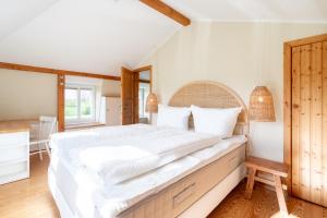 Voodi või voodid majutusasutuse Objekte im Umland Lübsche Mühle toas