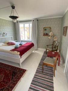 Postel nebo postele na pokoji v ubytování Ingmarsö B&B