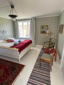 Postel nebo postele na pokoji v ubytování Ingmarsö B&B