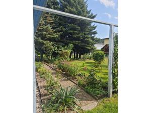 Taman di luar Ferienunterkünfte Schröder mit WLAN, Garten & Grill