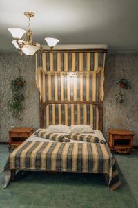 Отель Вышеград tesisinde bir odada yatak veya yataklar