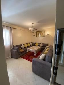 Χώρος καθιστικού στο Happy Appartement
