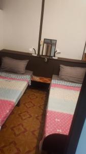 Postel nebo postele na pokoji v ubytování 3B Resort