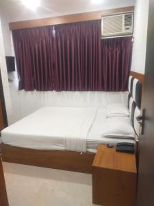 Postel nebo postele na pokoji v ubytování Hotel airport annex