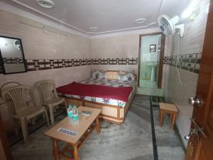 Postel nebo postele na pokoji v ubytování Hotel Rajpal Guest House