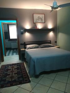 Postel nebo postele na pokoji v ubytování B&B Luna - Osio Sopra