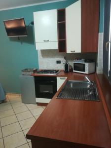 Kuchyň nebo kuchyňský kout v ubytování B&B Luna - Osio Sopra