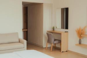 Postel nebo postele na pokoji v ubytování Limanaki Hotel