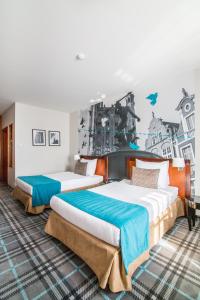 Posteľ alebo postele v izbe v ubytovaní Hotel Hanza
