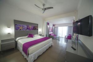Postel nebo postele na pokoji v ubytování Riu Cancun - Adults Only - All Inclusive