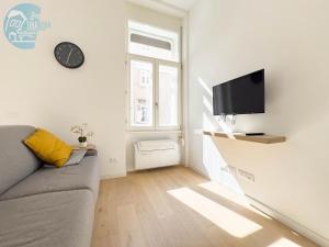 Televízia a/alebo spoločenská miestnosť v ubytovaní San Lazzaro 23 - 2 Tirabora Short Rent