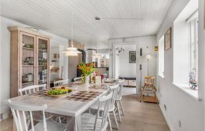 a kitchen and dining room with a table and chairs at Beautiful Home In Grlev With Wifi in Gørlev