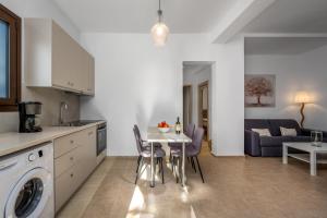 A kitchen or kitchenette at Ariadni Villas Faliraki