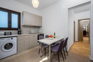 A kitchen or kitchenette at Ariadni Villas Faliraki