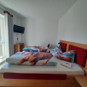 Postel nebo postele na pokoji v ubytování Regenbogenhof Rudelswalde