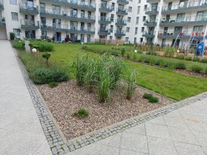 Vonkajšia záhrada v ubytovaní MAK Apartment Grobla - free parking - 3 rooms
